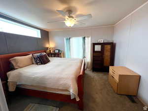 King bed shown here. Ceiling fan.