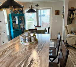 Custom built island adds extra storage and seating space.