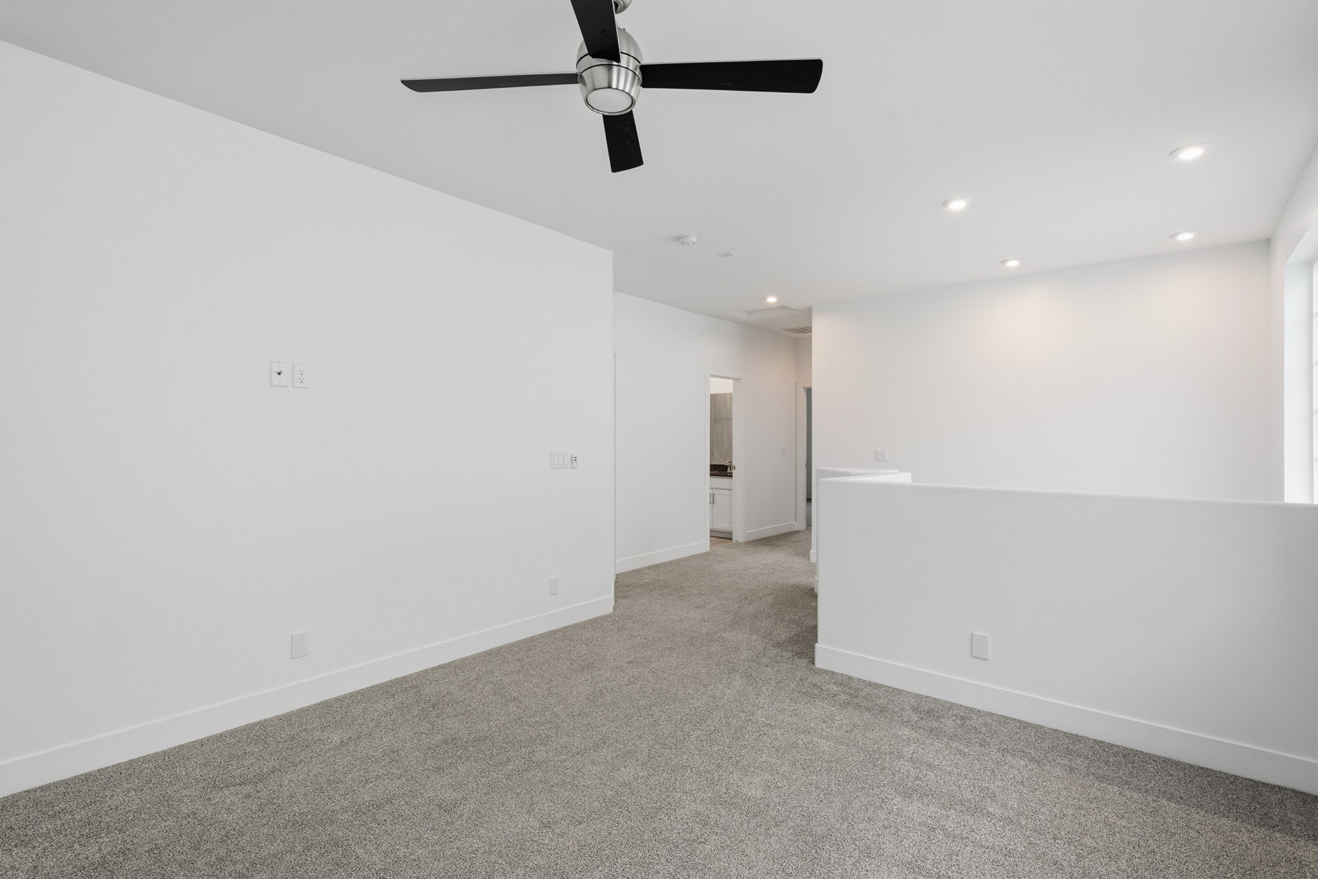 Unfurnished room with recessed lighting, light colored carpet, and a ceiling fan