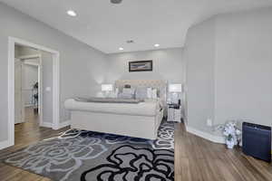 Bedroom featuring wood finished floors and recessed lighting