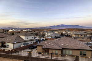 View of city with nearby suburban area and mountains