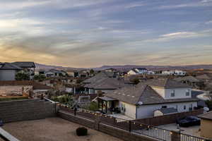 View of mountain background featuring nearby suburban area