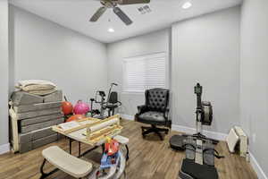 Office area featuring recessed lighting, wood finished floors, and a ceiling fan