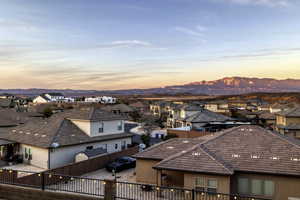 View of city with nearby suburban area and mountains