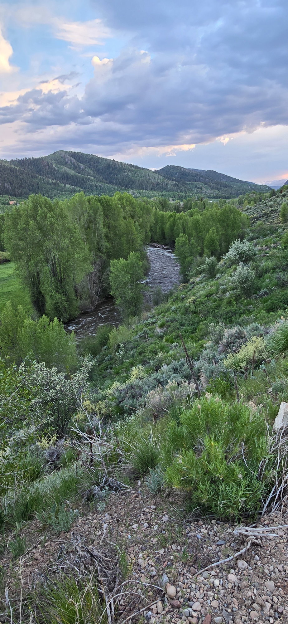 View of mountain background featuring a nearby body of water