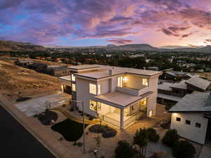 Aerial view at dusk of a mountain view and a residential view