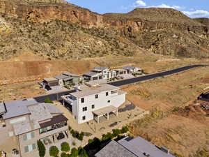 Aerial view of residential area with a mountainous background