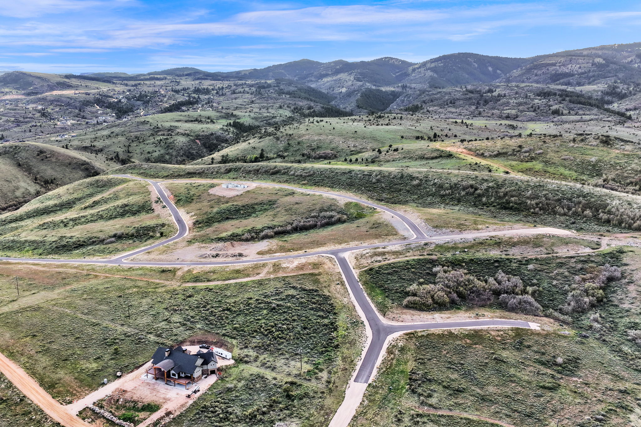 Mountainous landscape with a single-family home