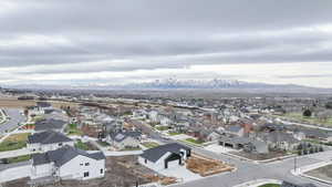 Aerial view of residential area with mountains