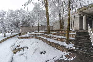 View of yard covered in snow
