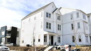 View of front of home featuring board and batten siding (pictures of home previously built)