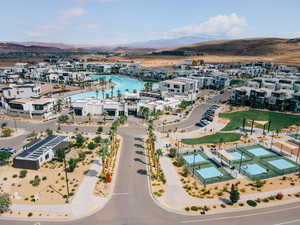 Aerial perspective of suburban area with a mountain backdrop