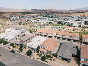 Aerial view of residential area with a mountainous background