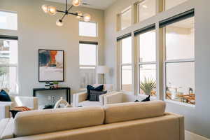 Living room featuring a chandelier