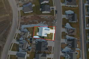 View of property location featuring nearby suburban area and property parcel outlined