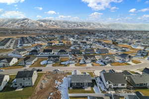 Aerial perspective of suburban area featuring mountains
