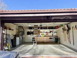 Garage featuring heating unit