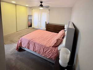 Bedroom featuring carpet flooring and a ceiling fan