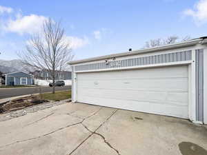 Garage featuring a mountain view