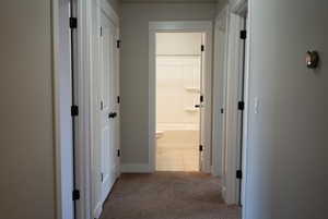 Hall with light carpet