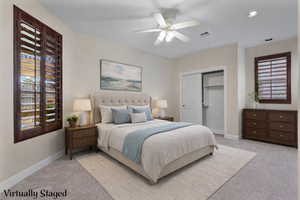 Bedroom featuring multiple windows, carpet flooring, a ceiling fan, and recessed lighting