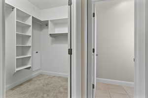 View of walk-in closet in Primary bedroom.