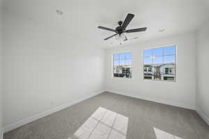 Unfurnished room with light carpet and ceiling fan