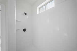 Full bathroom featuring a shower