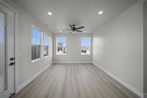 Unfurnished room featuring recessed lighting, light wood finished floors, and a ceiling fan