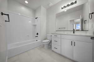 Bathroom with bathtub / shower combination and vanity