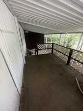 Exterior space with a carport