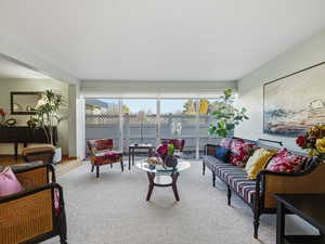 Living room featuring carpet floors