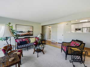 Living area with wood finished floors