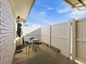 Fenced backyard featuring a patio area