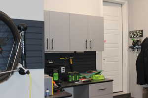 Garage featuring a sink