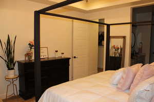 Bedroom featuring wood finished floors