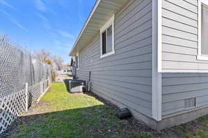 View of home's exterior featuring a central AC unit
