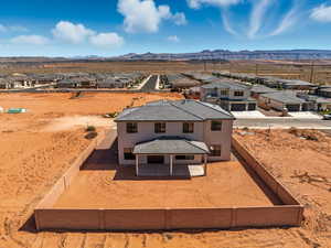 Aerial perspective of suburban area with mountains