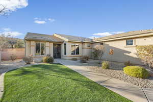 Ranch-style home with stucco siding