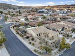 Aerial view of residential area featuring a mountainous background