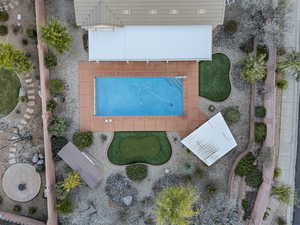 View from above of property with a pool area