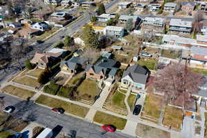 Aerial view of property's location with nearby suburban area