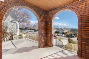 Covered porch with a residential view