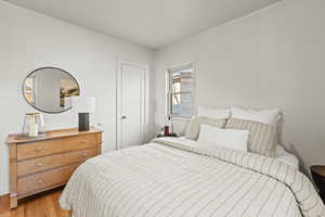 Bedroom featuring wood finished floors