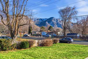 View of yard featuring a mountain view and a residential view