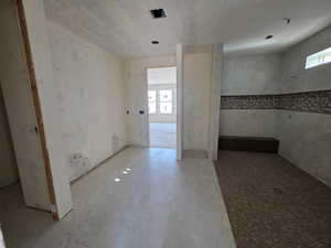 Bathroom with marble finish flooring