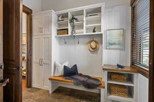 Mudroom with stone finish flooring