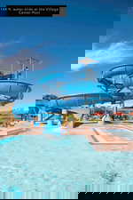 Community pool with a water slide