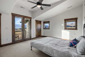 Bedroom featuring carpet, access to exterior, french doors, a ceiling fan, and lofted ceiling