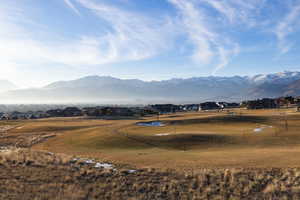 View of mountain background featuring nearby suburban area